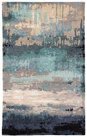 It is ideal for any space with heavy foot traffic inside of your home. Fairmount Abstract Handmade Tufted Blue Beige Brown Area Rug Blue Gray Area Rug Abstract Rug Modern Area Rugs
