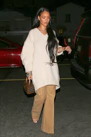 A fashion chameleon, rihanna isn't. Rihanna S Wears Cozy Oversize Sweater And Flare Trousers In L A Instyle