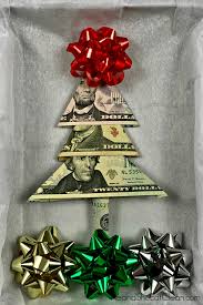 Easy money origami christmas tree tutorial on how to make a christmas tree out of one dollar bill. How To Fold A Christmas Money Tree