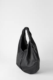 black bag with visual interest leder shopper taschen