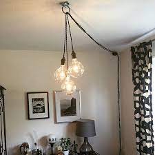They'll need to find a nearby power source for use your wire stripper to remove about an inch of the protective coating on the new light fixture's wires. How To Make Modern Diy Home Decor Projects Hanging Pendant Lamp Plug In Pendant Light Swag Pendant Light