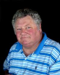 Caption: Austin Coil, Frank Hawley, Frank's mom, and his wife, Lana, at  E-Town in 1981.