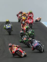 Marc Marquez Of Spain Rides The Repsol Honda Team Honda Leads The Field Over The Hill During The 2014 Motogp Of Australia At Philli Marc Marquez Marquez Motogp