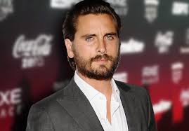 SCOTT DIST.( ) Long-time civil servant and former District Commissioner Ernie  Scott died