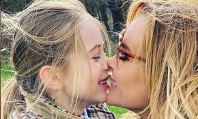 Amanda holden has shared unseen family snaps as her 'charming fairy' daughter hollie turns nine. Amanda Holden S Video Of Daughter Hollie Sparks Debate Among Fans Hello