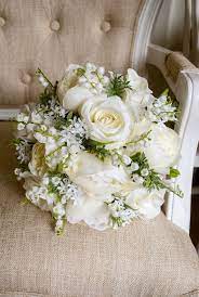 We stock a wide range of bouquets for wedding and everyday purposes. Natural Ivory And White Silk Wedding Bouquet Made With Artificial Roses Peonies Bouv Artificial Wedding Bouquets Rose Wedding Bouquet White Wedding Bouquets