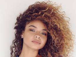 1.10 short curly cut with sweeping side bangs. Who S Your Celebrity Curly Hair Twin Naturally Curly Teen Vogue