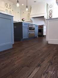 Picking floor color for kitchen with cherry cabinets. Thinking Of Staining Your Hardwood Floors A Dark Color