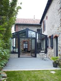 A La Plaine Sur Mer 44 Certaines Verandas Necessitent En Amont Une Bonne Dose De Creativite Et D Imaginati Modele De Veranda Maison En Pierre Maison Bretagne