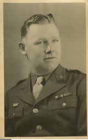 American medic tends to wounded German soldier