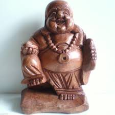 According to buddhist mythology, buddha statues are held as a symbol for many subjects. Travelling Happy Buddha Statue Wood Carved Carving Art Sculpture Bali 21cm Tropical Scene