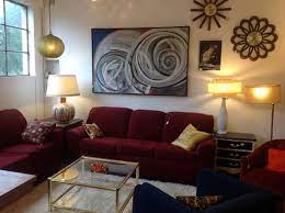 Love The Maroon Couch Against The White Wall With The Funky Swirly Art Loungelizardpdx Teal Walls Living Room Teal Living Rooms Maroon Living Room