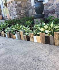 Wood log garden edging is one of the best ideas to emulate in your garden designs. 10 Wonderful Ways To Use Pallets Wooden Garden Edging Garden In The Woods Garden Edging