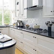 White Kitchen With Black Worktop Decorating Ideal Home Trendy Kitchen Tile Kitchen Black Counter White Kitchen Black Worktop