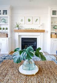One of the biggest mistakes that people make when decorating tall walls is they get the scale all wrong. Easy And Inexpensive Shiplap Fireplace Wall Sand And Sisal