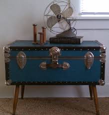 Steampunk industrial table / pub, sofa console / 55 / antique furnace door / steam gauge / barnwood / table #3323 $4,499.99 steampunk industrial / carroll shelby / manifold / valve cover / automotive / coffee table #3305 Low Stand Fan On Steamer Trunk Coffee Table In Bedroom With Beige Carpeting Wicker Trunk Coffee Ta Coffee Table Trunk Coffee Table Wood Coffee Table In Bedroom