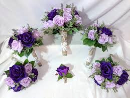Artificial flower arrangements are becoming very sophisticated in design. Purple And Mauve Roses Lavender Sprigs Featuring Burlap Lace Stems Cheap Wedding Bouquets Real Touch Wedding Flowers Wedding Bouquets