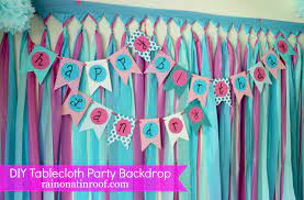Plastic tablecloths are so handy for a kid's party! Diy Party Background For 5 Or Less
