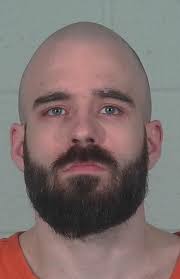 Man charged with punching police officer