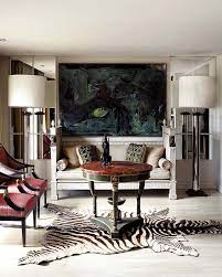 Obviously i could lose the red rug and just have a big grounding blue rug but i just love having that quirky red vintage rug in there. The Dos Of Decorating With Zebra Skin Rug Living Room Designs Living Room Decor Rugs In Living Room