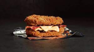 It consists of two pieces of chicken (grilled or fried) as the bun, with melted cheese and bacon in the middle. Kfc Is Bringing Back Its Legendary Double Down Burger For A Limited Period Ladbible