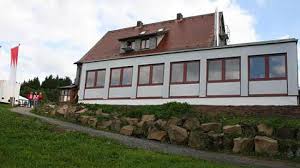 The totnansberg, occasionally also called the totmannsberg, is the highest peak in the black mountains, a subunit of the rhön in central germany. Rhonklub Baute Am Wurzburger Haus An Mehr Platz Fur Wanderer
