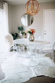 One Dining Table Two Ways For The Love Blogger Home Decor Dining Room Table Ki Faux Marble Dining Table Ghost Chair Dining Room Dining Table Marble
