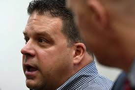 Troy cop charged with assaulting man at Little League game