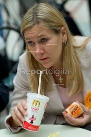 Liberal Democrat candidate Jody Dunn drinking a…