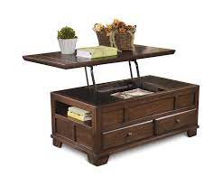 With the warm rustic brown finish flowing smoothly over the profiled edges and frame details, the gately accent table collection offers the. Gately Lift Top Coffee Table Hom Furniture