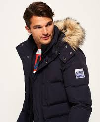 Elle est munie de manches longues, de 2 poches pressionnées à la poitrine, ainsi que de 2 poches à rabat boutonné à l'avant. Superdry Sd Expedition Parka Herren Jacken Und Mantel