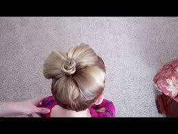 You can always use hair accessories for them, a ponytail or curly hair usually suit the little faces of the pretty angels. How To Do A Flower Bun Easter Hairstyle Pretty Hair Is Fun Youtube