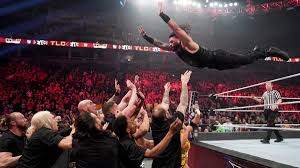 Photos The Big Dog Seeks Retribution Against King Corbin In Wild Tables Ladders Chairs Match Roman Reigns Reign Tlc