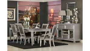 Generally the woods used for formal or traditional dining sets are mahogany and walnut. Agata Contemporary Dining Room Set