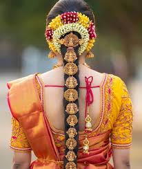 Another wonderful way to glam up indian bridal hairstyle for your wedding! Beautiful South Indian Jadas We Spotted On Real Brides