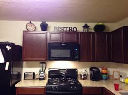 I hope this helps you decide how to decorate the top of your kitchen cabinets. Kitchen Cabinet Decorating Ideas Cabinet