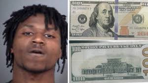 Police arrest man accused of using fake 'motion picture' money