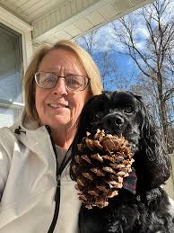 Mayla absolutely loves pine cones