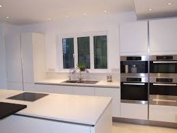 A Bank Of Appliances Create A Great Feature In Crisp White On White Kitchens German Kitchen White Mattwhite Sile German Kitchen Kitchen All White Kitchen