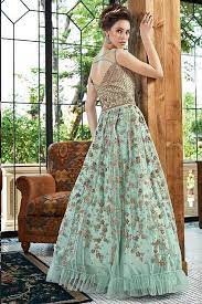 Wear a ball gown that has a bounce to it, so evening party wear long gowns are usually simple yet elegant. Buy Party Wear Floral Embroidered Anarkali Dress In Net Online Like A Diva