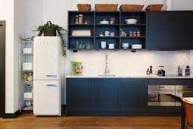 20 Modern Kitchens With Cool Retro Appliances Dark Blue Kitchens Small White Kitchen Cabinet Small White Kitchens