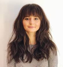 However, long locks draw the gaze long wavy hair with bangs is a youthful and feminine hairstyle that you can dress up or down. 33 Curly Hair Straight Bangs Amazing Concept