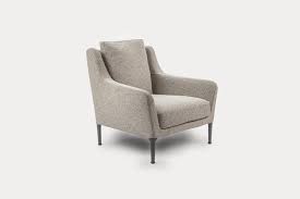 edouard is a chair endowed with powerful aesthetic and functional charm it was designed to create restful sit this cha fabric lounge chair chair lounge chair