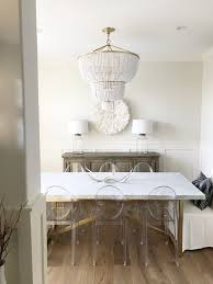Dining Room Jacqueline Chandelier And Restoration Hardware Torano Table Ghost Chairs Juju Hat Ghost Chair Dining Room Ghost Chairs Dining Acrylic Dining Chairs
