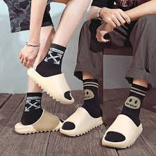 The yeezy slide 'resin' showcases kanye west's minimalist interpretation of an athletic sandal. Fancy Adidas Yeezy Slides Bone Fw6345 For Unisex Rs 1399 Pair Id 23004067755