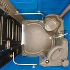 portable toilet with a flush and sink