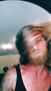 Gay Guy with A Blonde Beard and Long Hair