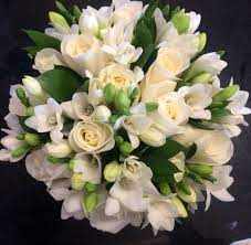 Roses Freesia And Ruscus Pure White And Green Bouquet This Bride S Wedding Flowers Bouquet Flower Bouquet Wedding Bright Wedding Flowers Wedding Flowers