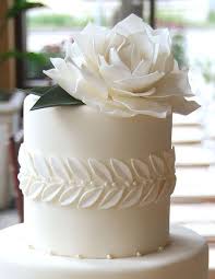 Modern wedding cake with isomalt flower. 25 Timeless Yet Trendy All White Wedding Cakes Weddingomania