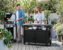 It provides a stainless steel top for serving drinks, holding storage capacity: Buy Keter Unity Xl Portable Outdoor Table And Storage Cabinet With Hooks For Grill Accessories Stainless Steel Top For Patio Kitchen Island Or Bar Cart Dark Grey Online In Turkey B084r2gj3w